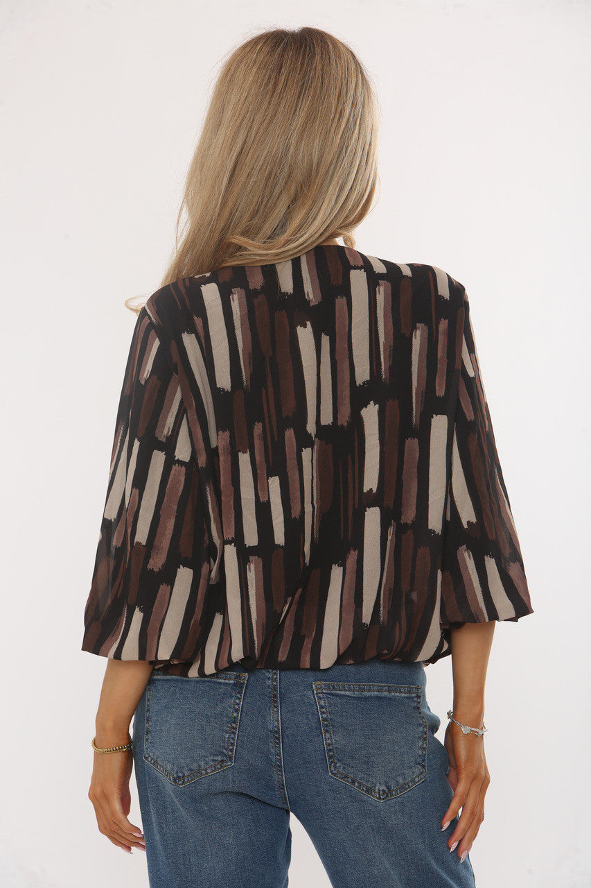 BLOUSE MET ABSTRACTE PENSEELSTREEKPRINT ZWART