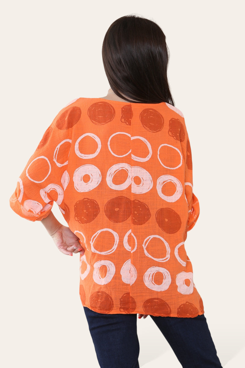 TOP MET CIRKELS EN SCHETSEN PRINT ORANJE