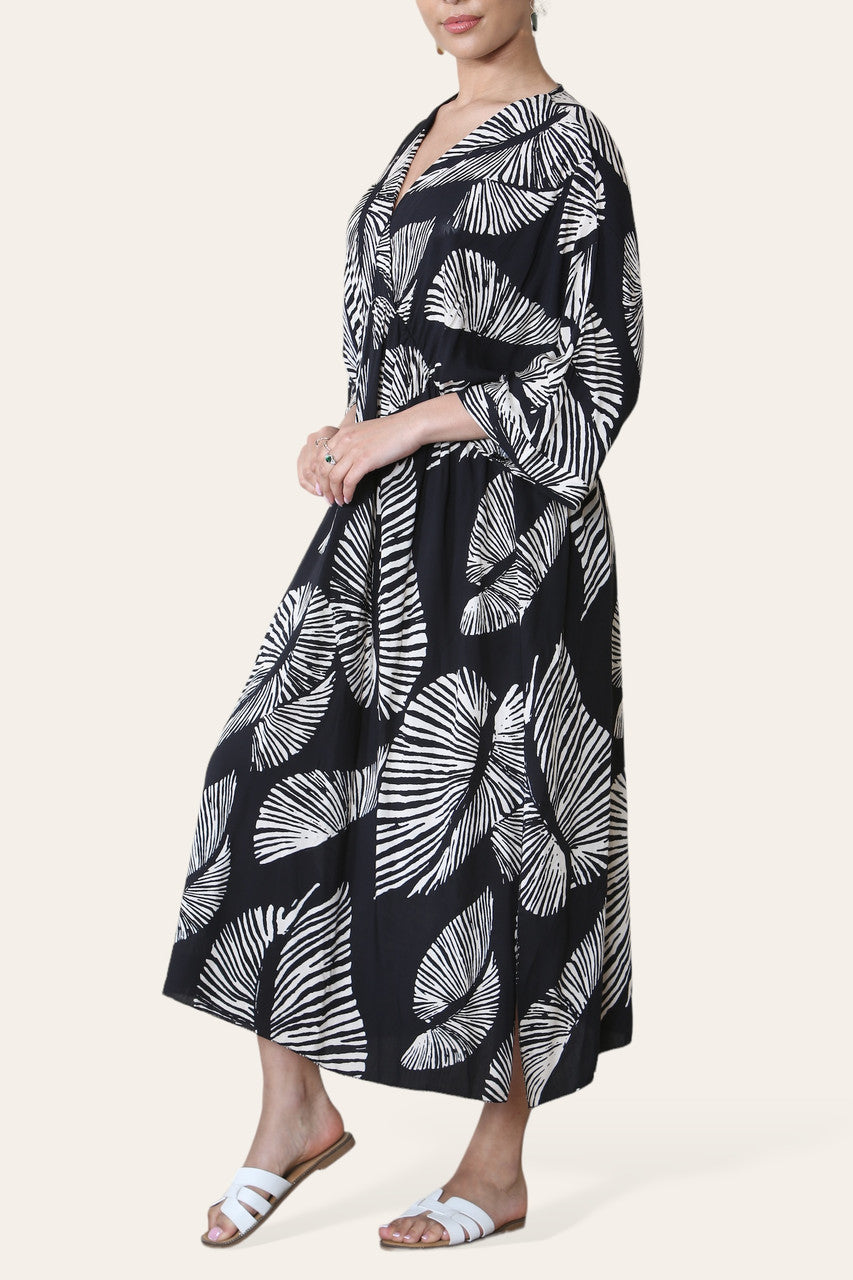 MAXI-JURK MET PALMBLAADPRINT - ZWART