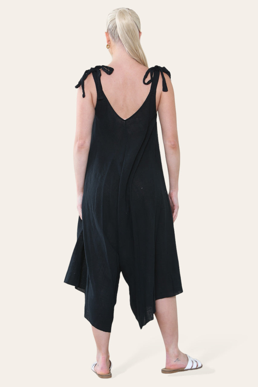 JUMPSUIT ZWARTE KATOEN MET STRIKJES OP DE SCHOUDER