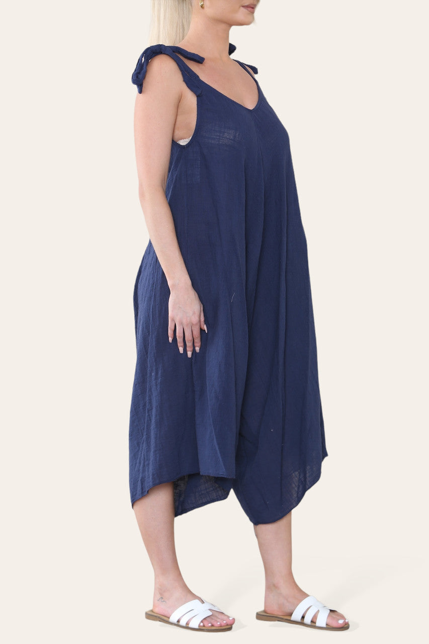 KATOENEN JUMPSUIT MET STRIK DETAILS OP DE SCHOUDERS NAVY