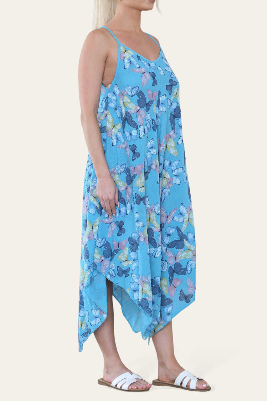JURK MET VLINDERPRINT EN SPAGHETTIBANDJES TURKOOIS