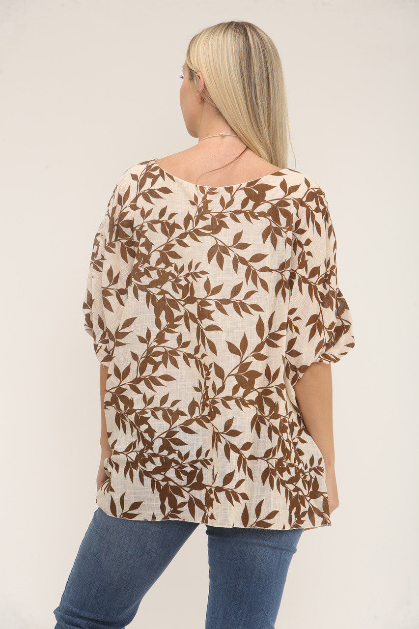 LEAF PRINT TEXTURED BATWING TOP WITH NECKLACE - RUST