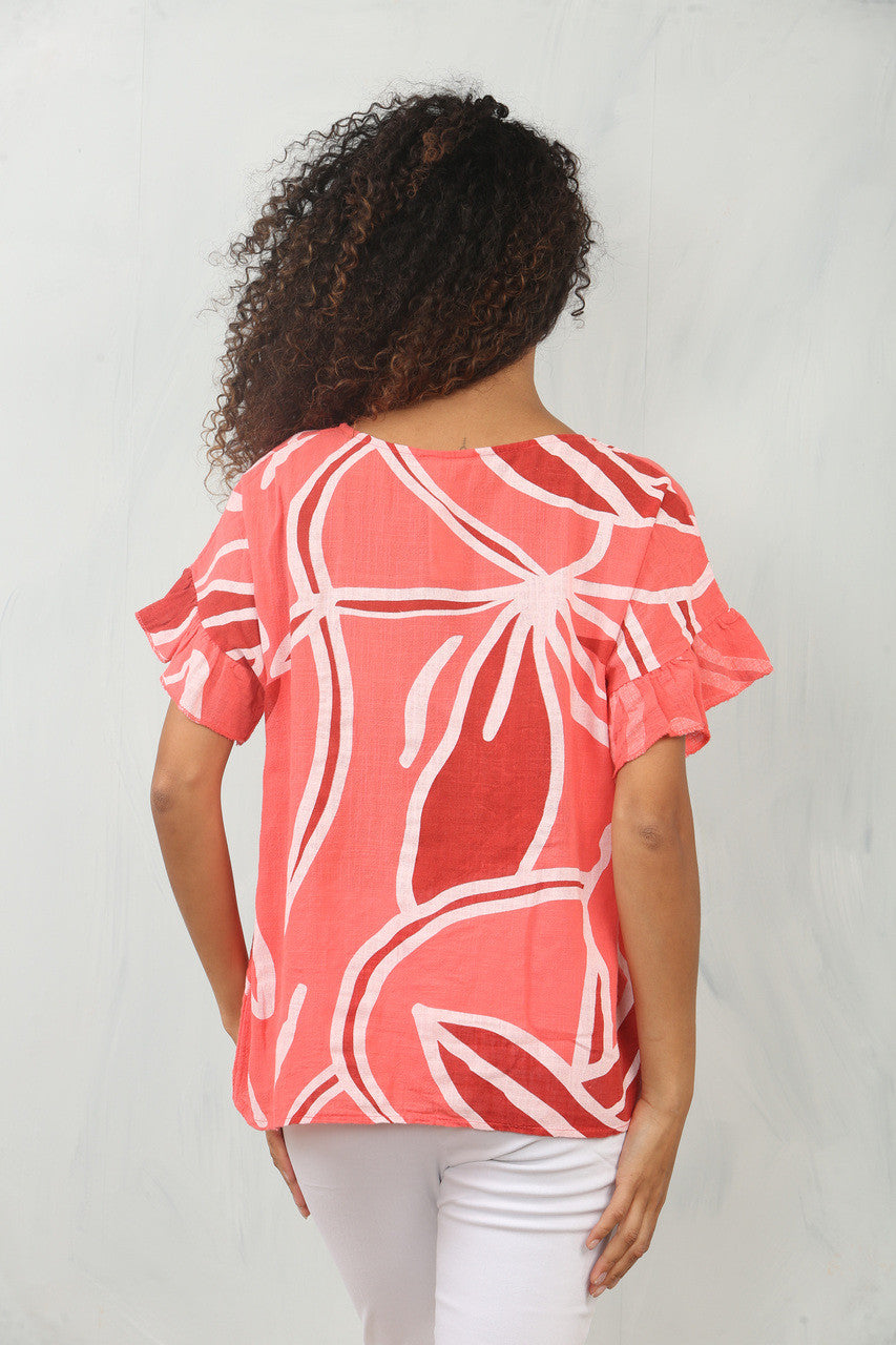 TOP MET BLADERENPRINT, RUFFELMOUW EN KORAALKLEUR