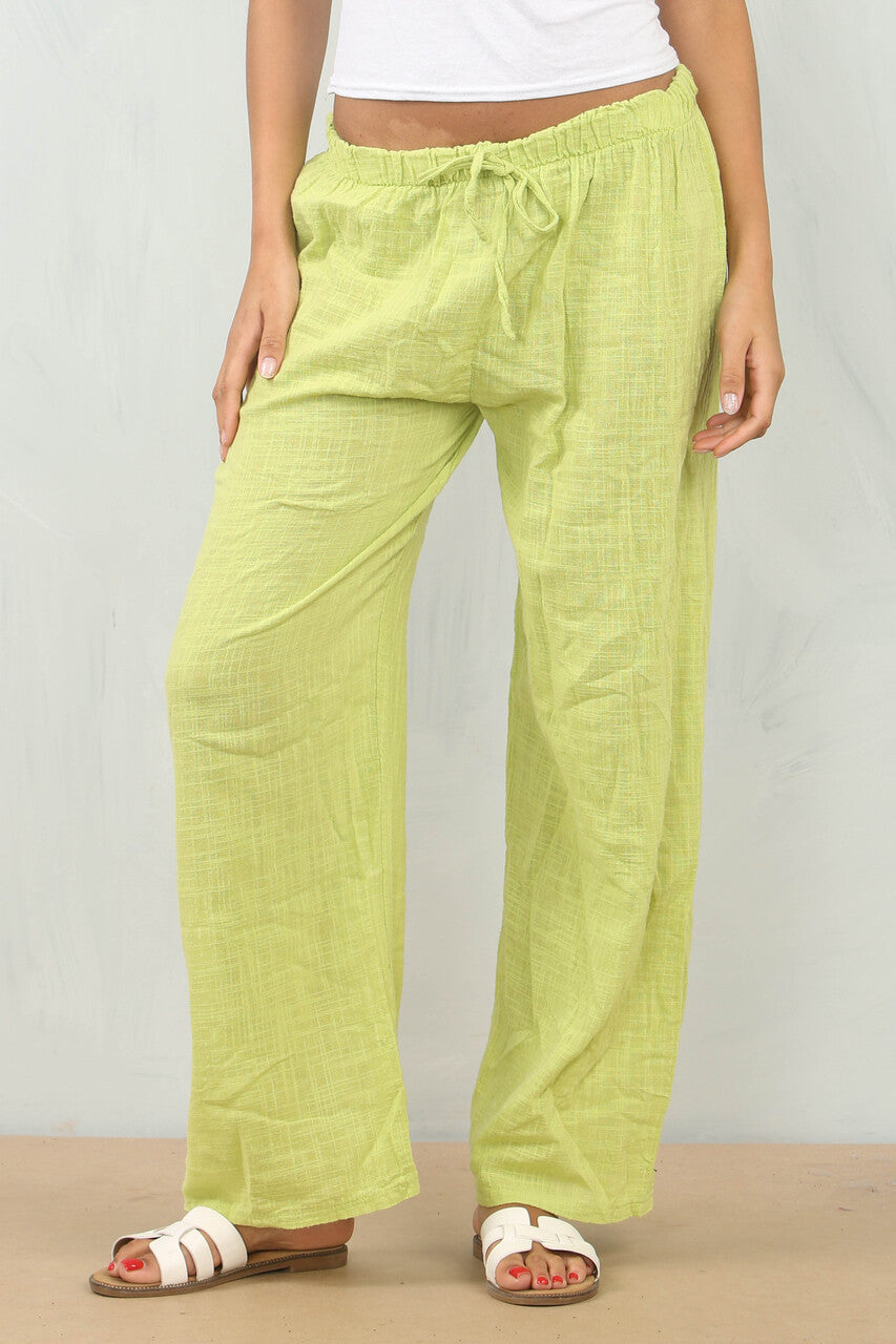 KATOENEN BROEK MET ELASTIEK IN DE TAILLE LIMOENGROEN