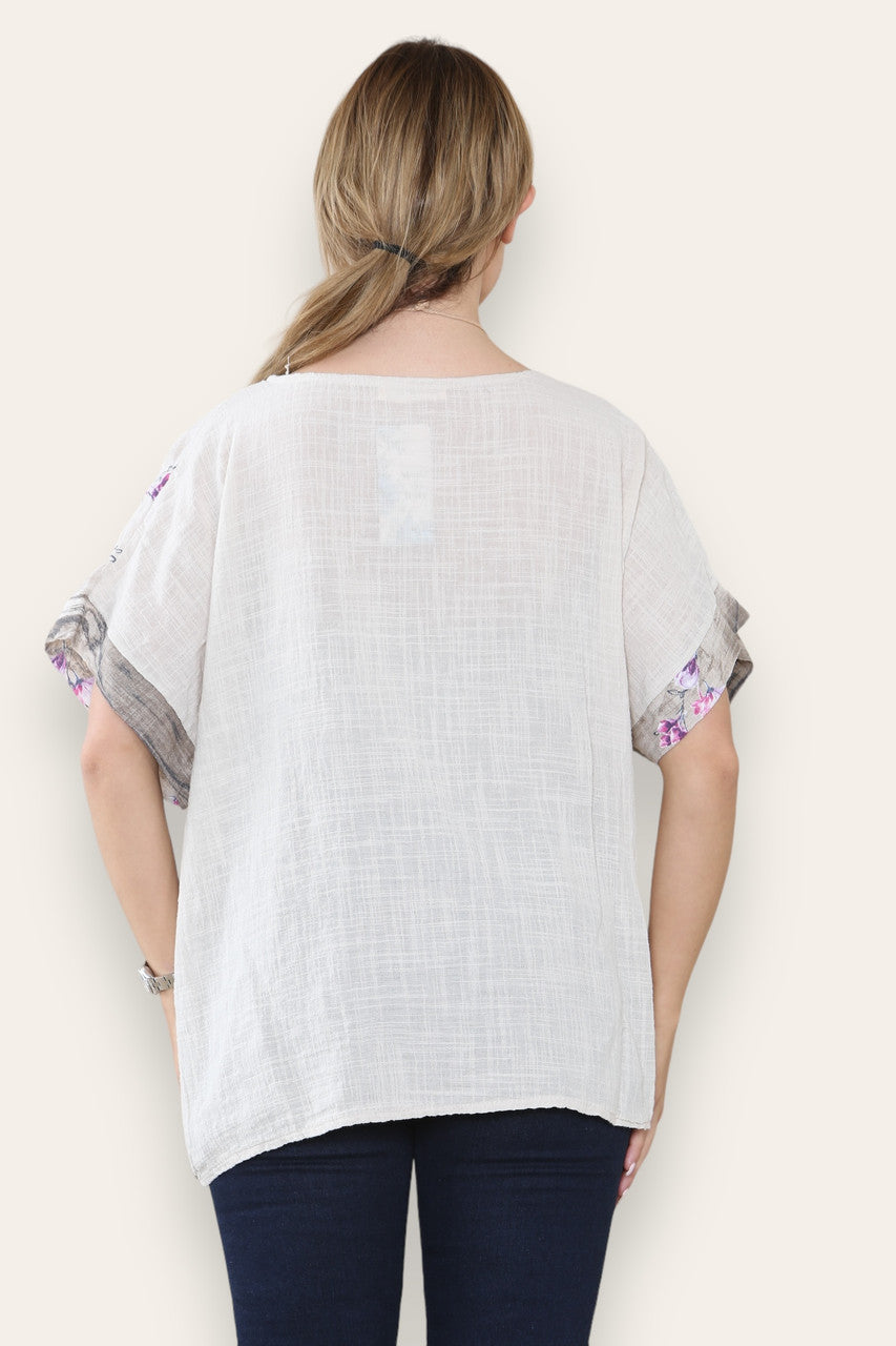 BLOSSOM BLOUZE MET BLOEMENBOORDSTEENPRINT