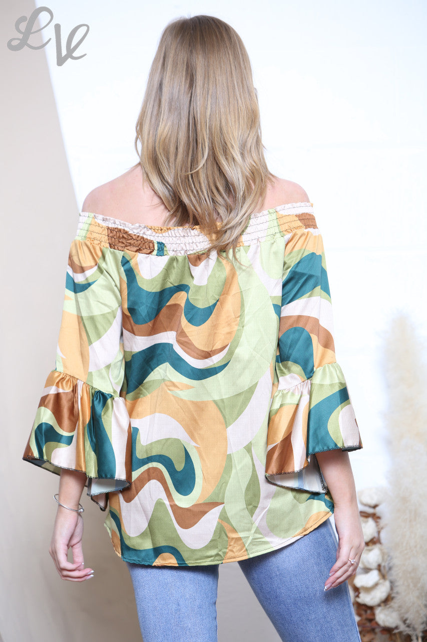 Dames blouse met elastische halslijn en gekleurde wervelprint groen
