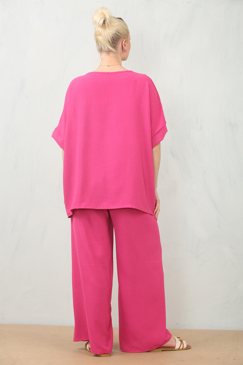 LUCHTIGE BLOEMEN CORSAGE TOP & BROEK SET - CERISE