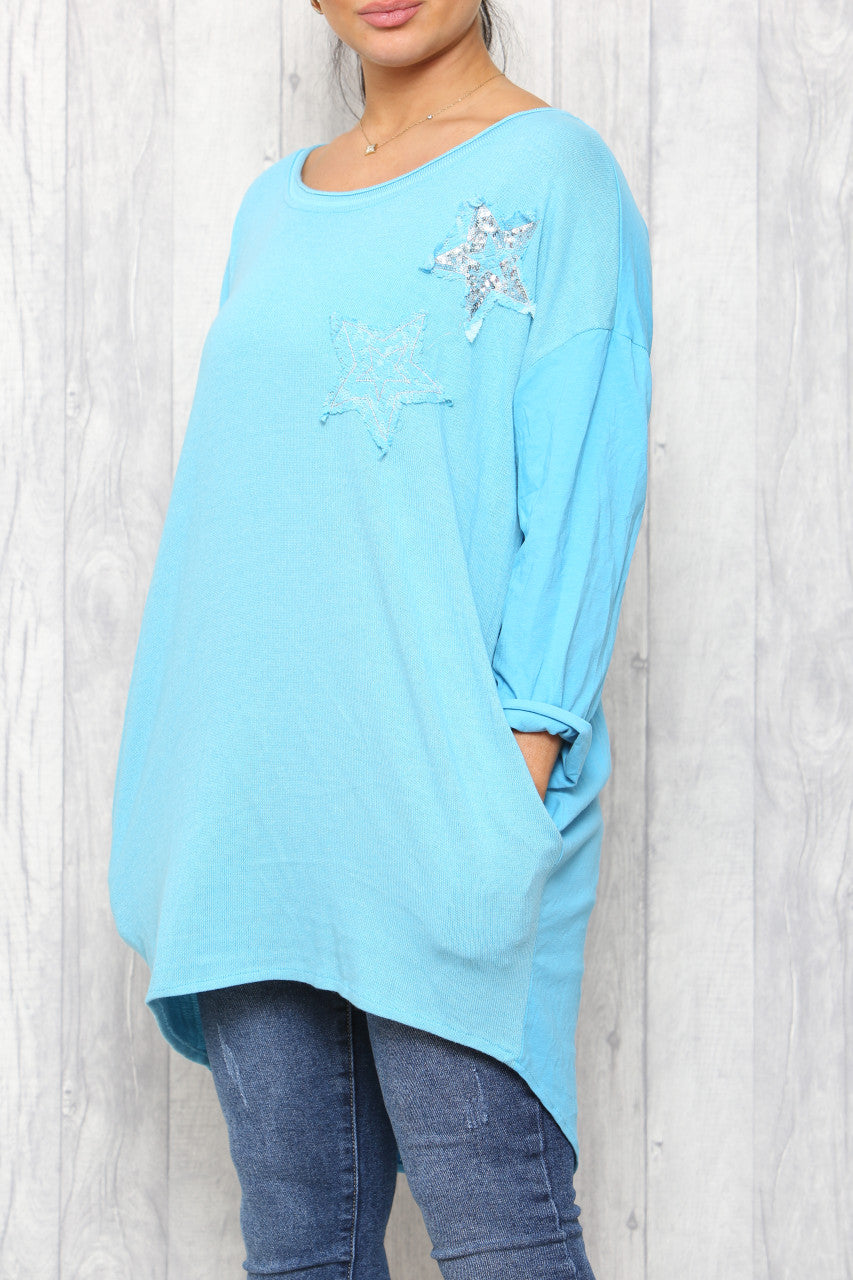 Dames distressed tuniektop met lovertjessterren turkoois