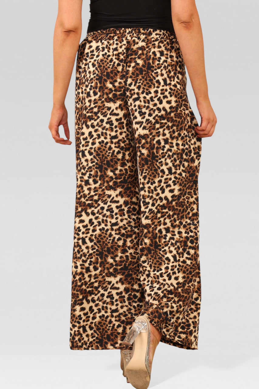 BROEKEN MET BREDE PIJPEN, ELASTIEKE TAILLE EN CHEETAHPRINT
