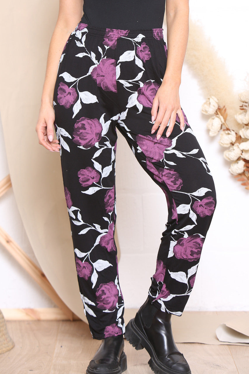 Dames broek met bloemenprint roze zwart