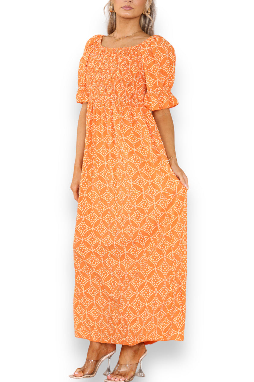 FLADDERIGE GEOMETRISCHE BLOEMEN BARDOT MAXIJURK ORANJE