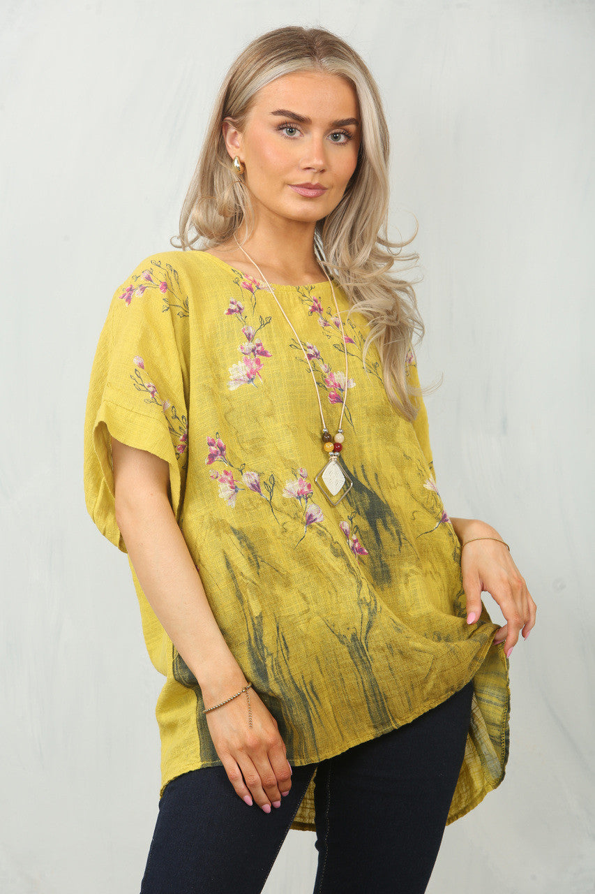 TOP MET BLOEMENRANDPRINT - MOSTERD