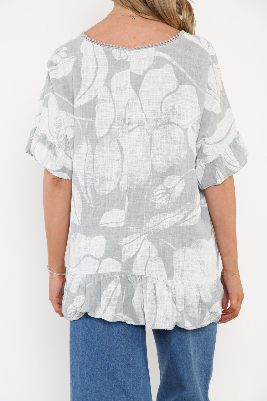 Dames top met bloemenprint, ruches en zilver