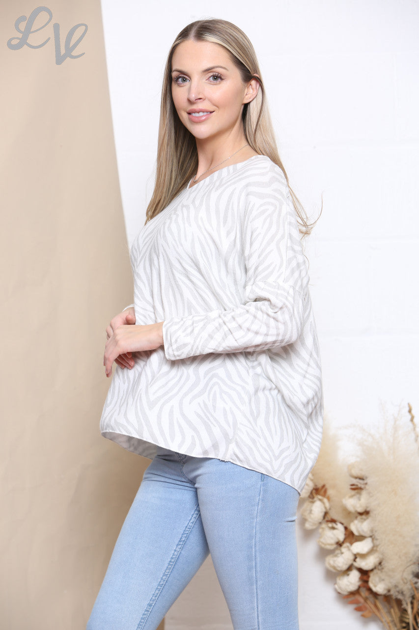 Dames fijngebreide trui met zebraprint wit