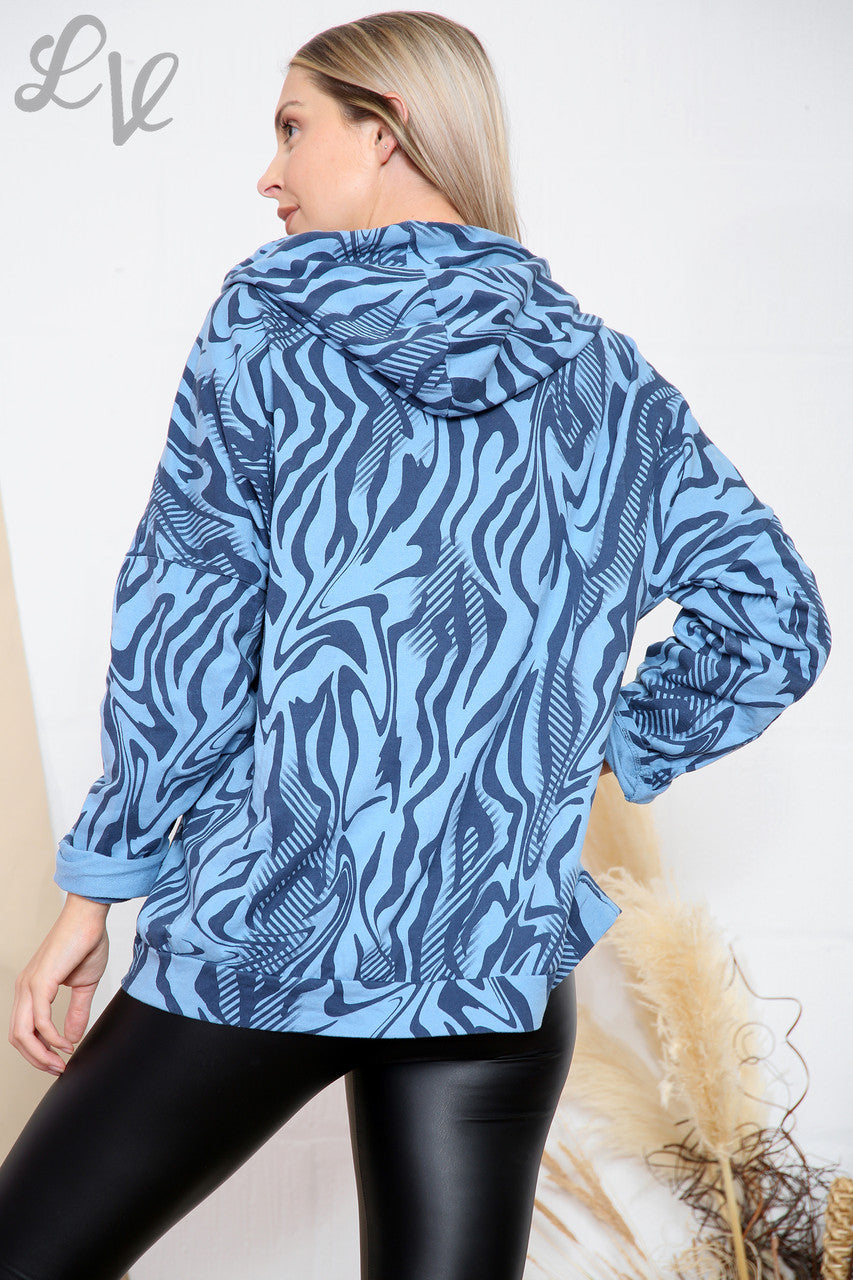 Dames capuchontrui met tijgerprint en denim, prijs per stuk €6,99