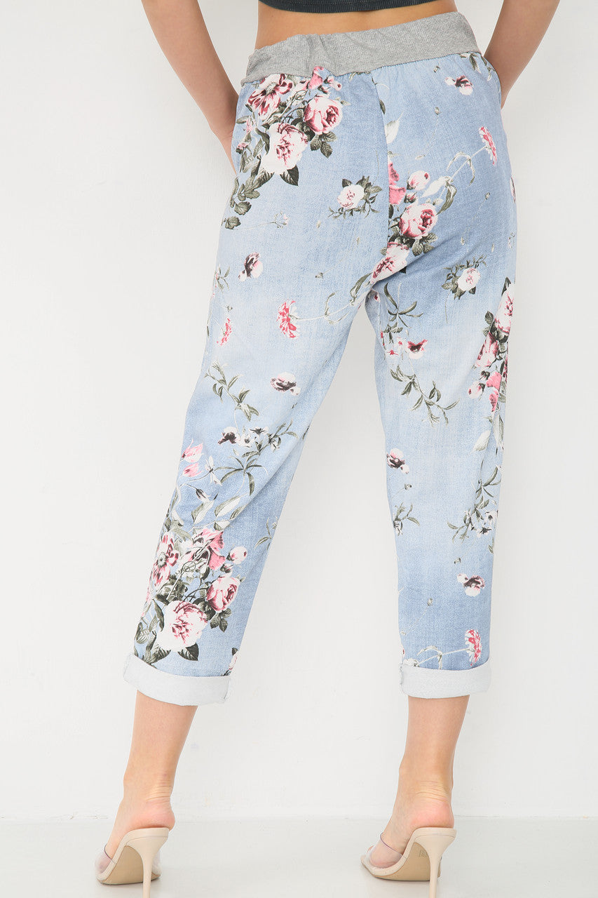 JOGGINGBROEK MET BLOEMENPRINT - LICHTBLAUW