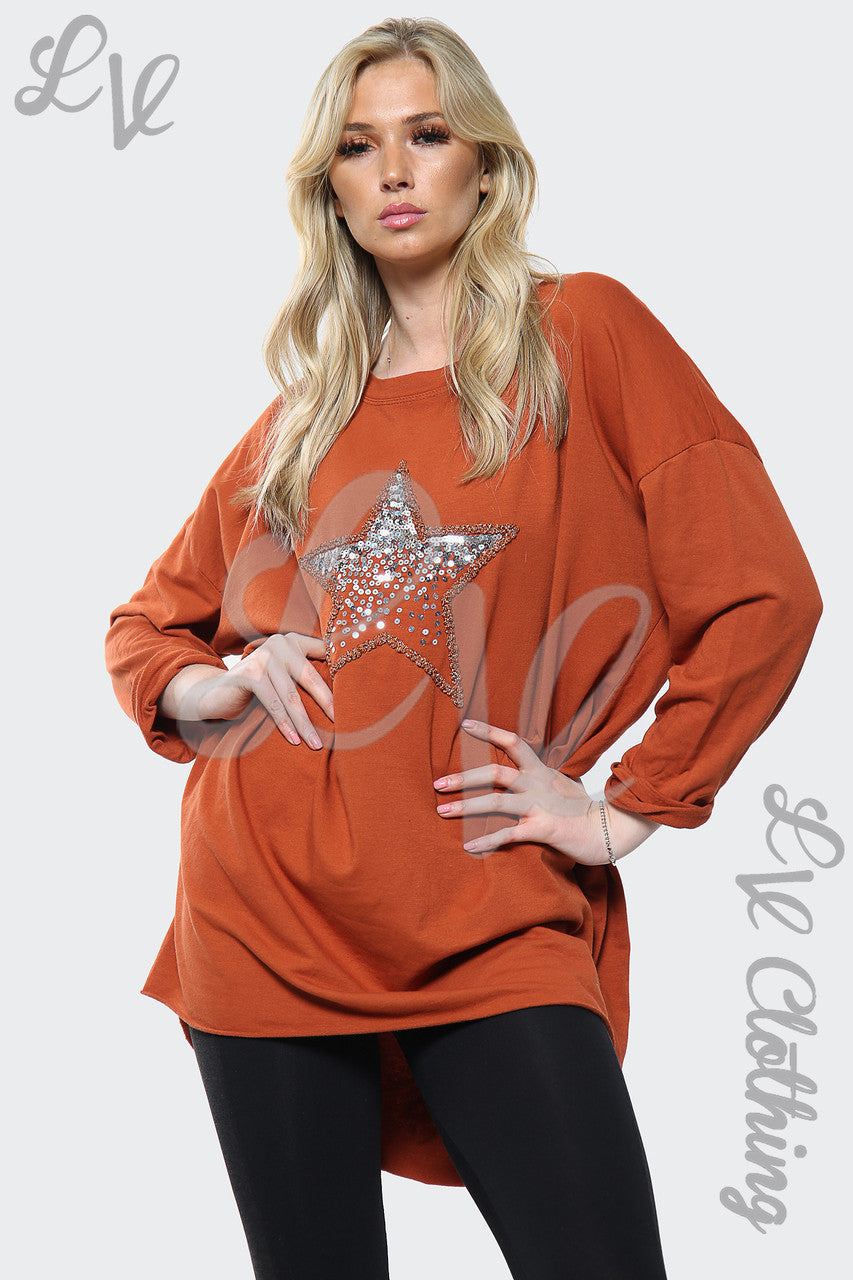 Dames zilveren top met paillettensterrenprint in Italiaanse oversized stijl roestkleurig Prijs per eenheid €13,99