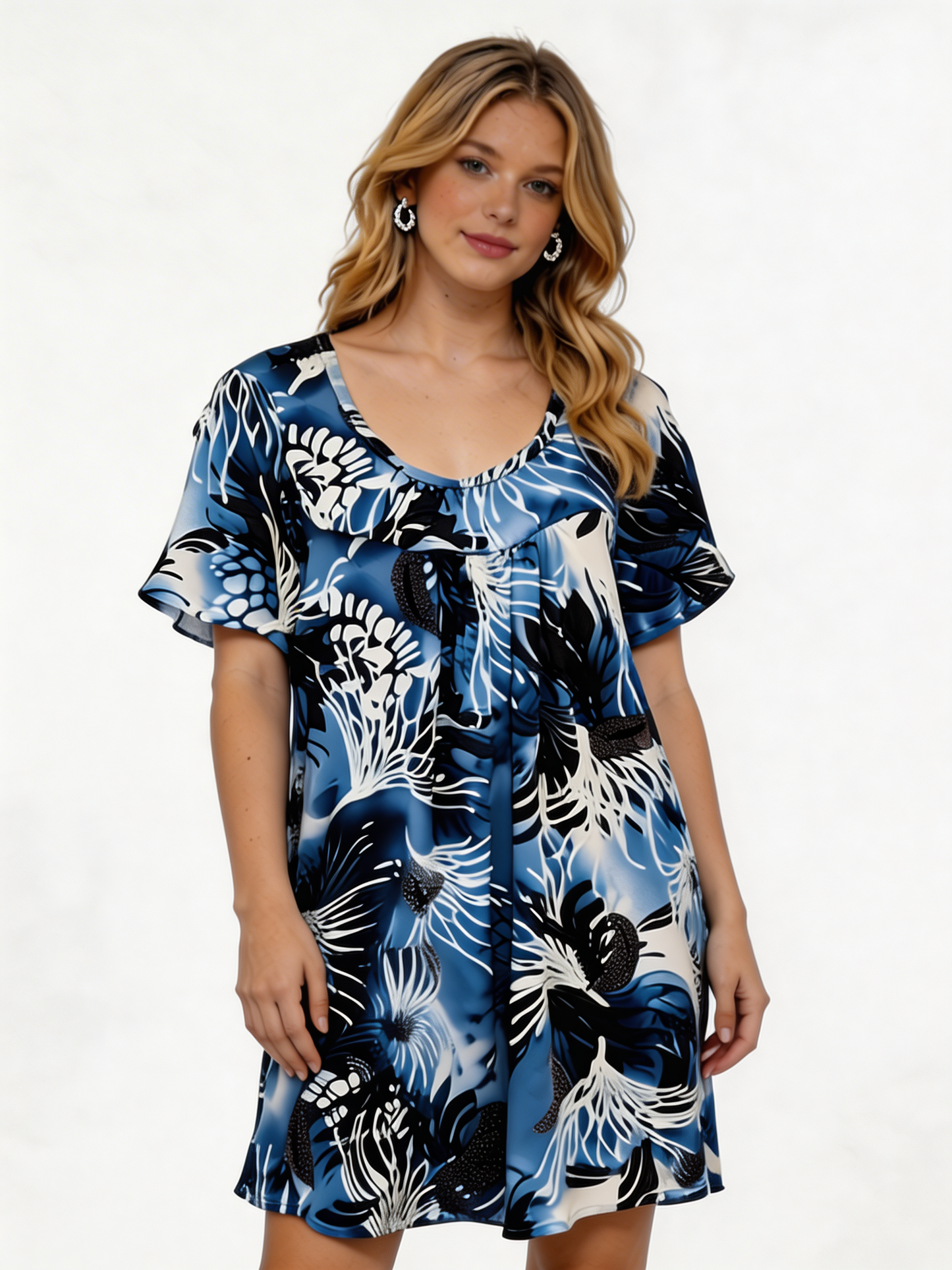 Swingjurk met tropische bladprint – Smockjurk met korte mouwen - Blauw