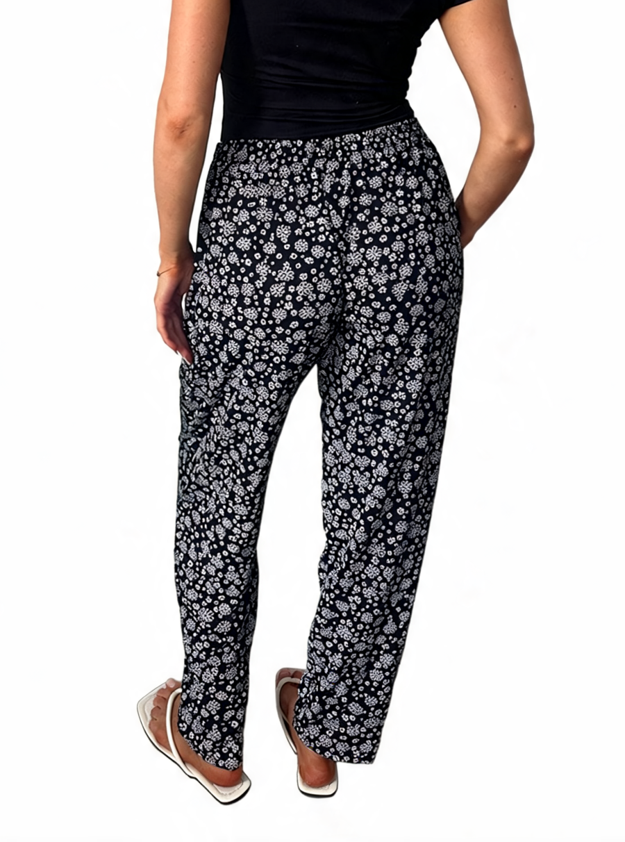 Dames broek met vierkante swirlprint zwart