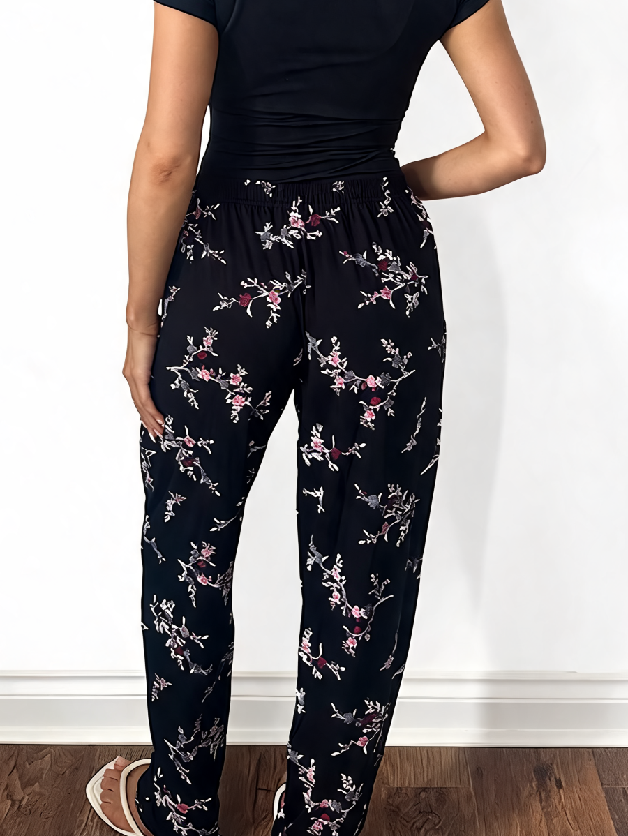 Dames broek met vierkante swirlprint zwart