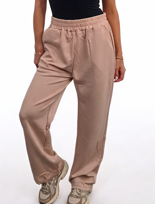 Beige relaxed straight-leg jersey joggers with elastic waist, front view