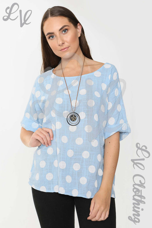 Light blue spotty print ladies top, short sleeves, loose fit, round neckline