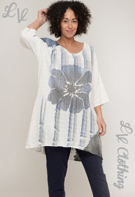 Floral tie-dye tunic with blue flower print on white, scoop neck, long sleeves.