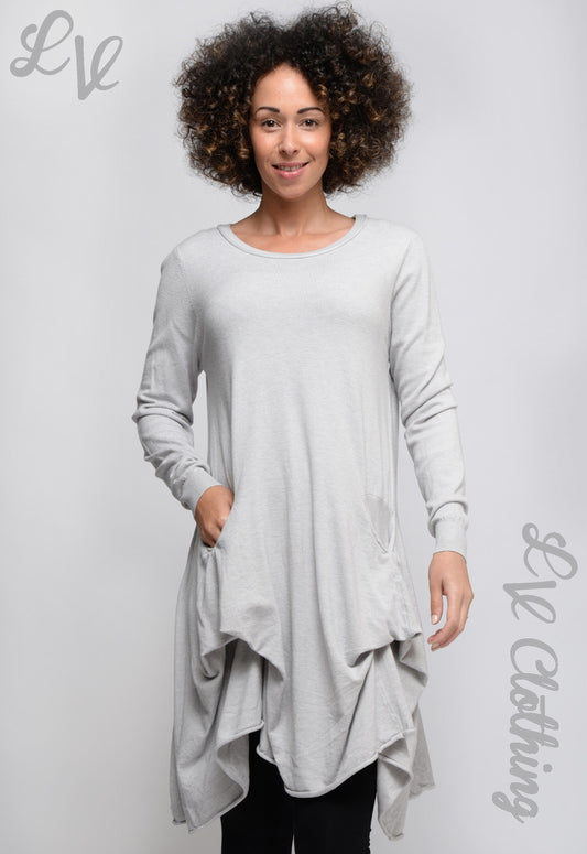 Grey draped knitted top with long sleeves and uneven hem