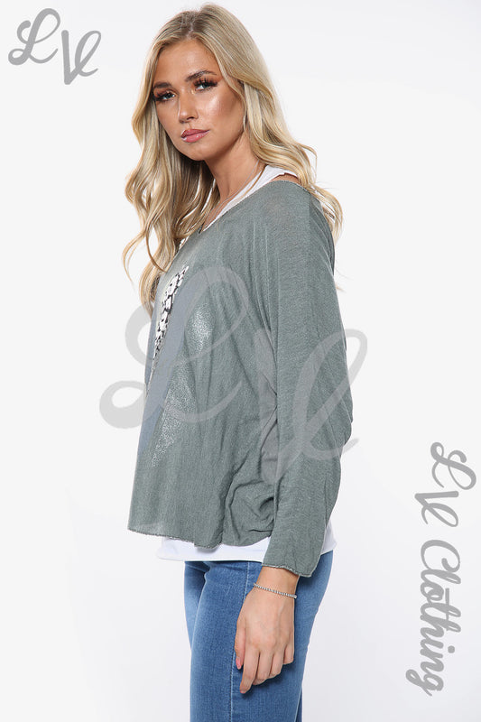 Two-layer slogan top in dark grey, long sleeves with layered white under-hem