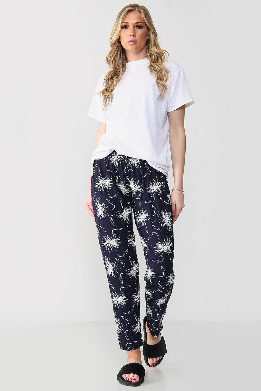 ELASTISCHE BROEK MET PAARDEBLOEMENPRINT MARINE