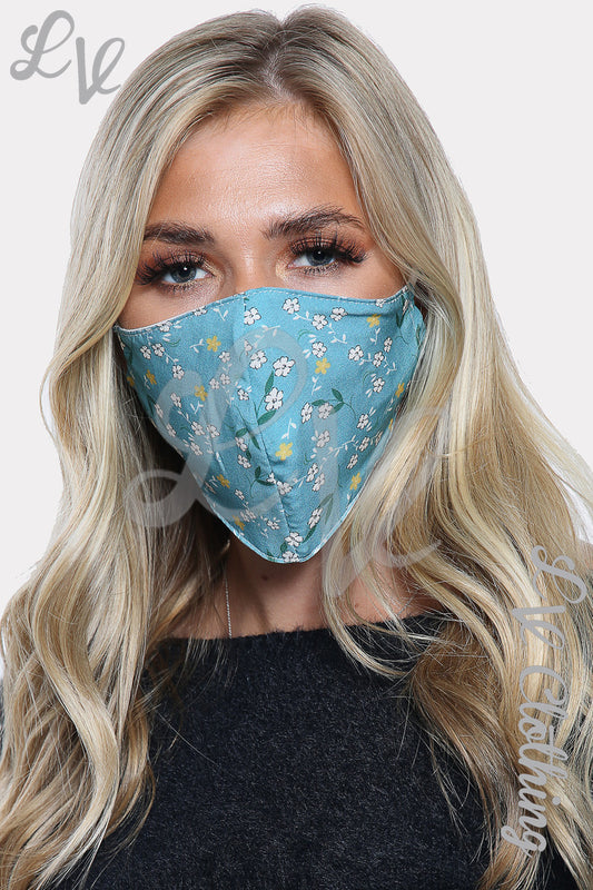 Women’s blue face mask with small daisy and leaf print