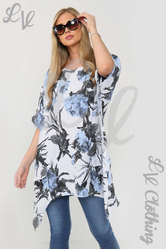 White smock tunic with blue and black flower and leaf print, 3/4 sleeves