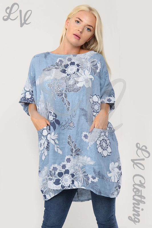 Blue denim smock top with large white floral print, 3/4 sleeves