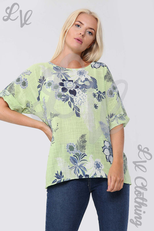 Green ladies floral print top with round neck, short sleeves, relaxed fit