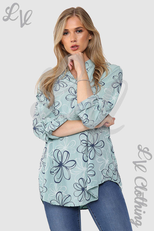 Turquoise floral outline grandad collar blouse with long cuffed sleeves