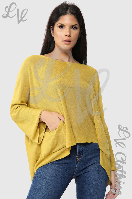 Mustard yellow fine knit long-sleeve top with relaxed fit and crew neckline
