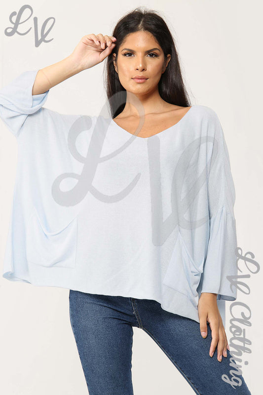 Light blue fine knit V-neck long sleeve top, relaxed fit