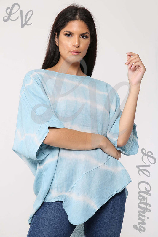 Asymmetrical tie-dye top in light blue with layered drape hem and wide sleeves