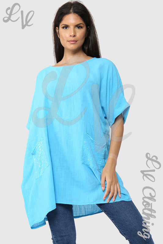 Sky blue lagenlook shift top with draped sleeves, loose fit, textured front detail