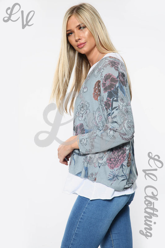 Two-layer floral top in light blue with white underlayer hem