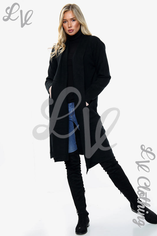 Long black knitted cardigan jacket with open front and long sleeves