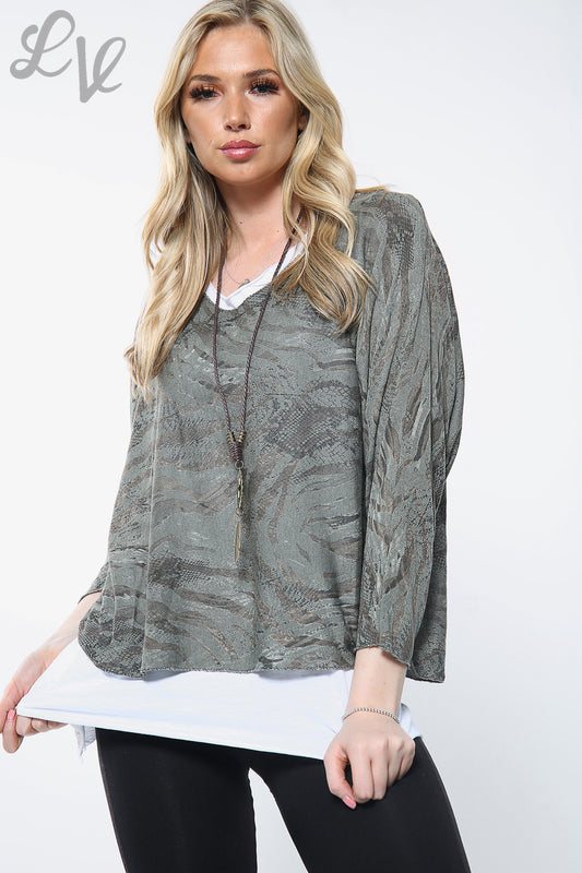 Two-layer printed long-sleeve top with faux necklace detail and white underlayer