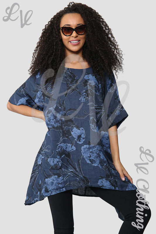 Smock top with navy flower-and-leaf print, short sleeves, loose fit