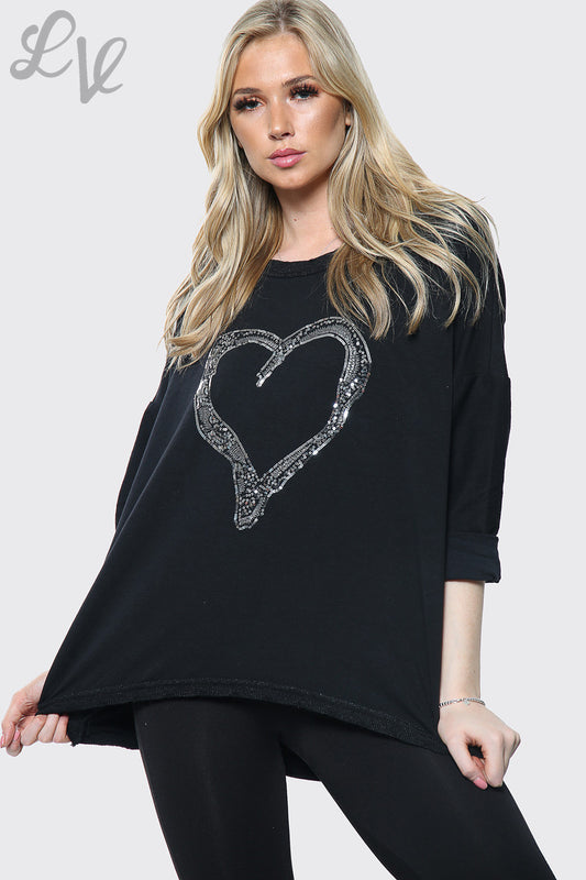 Women's black long-sleeve top with silver heart print on chest