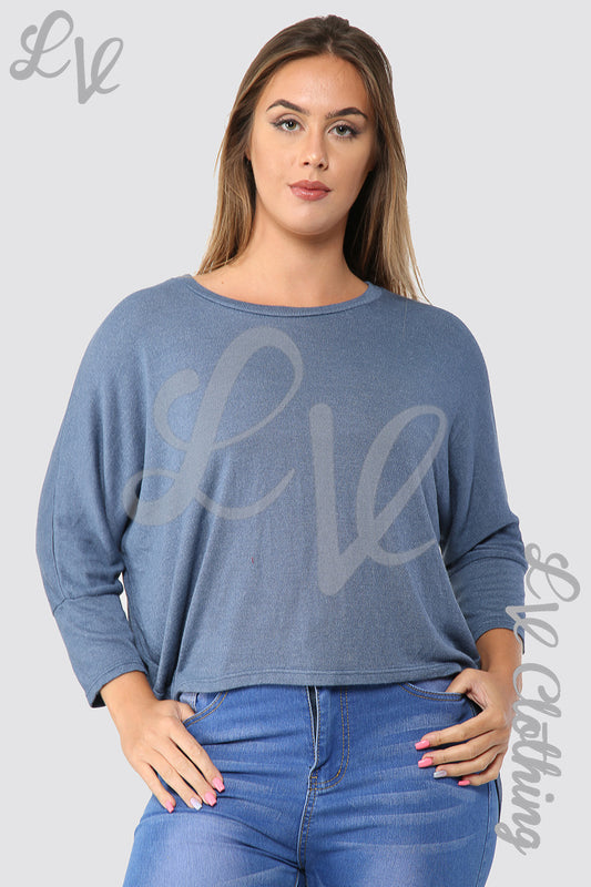 Denim-blue fine knit top with hi-lo hem, boat neckline, 3/4 sleeves, relaxed fit