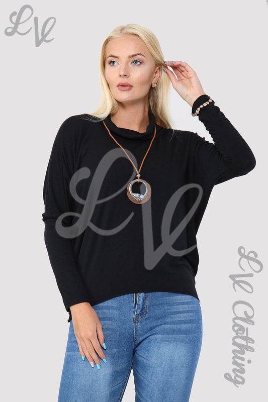 Black cowl neck top with long pendant necklace, long sleeves, relaxed fit