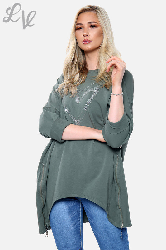 Green ladies sweatshirt with heart embroidery, half-zip detail, long sleeves and curved hem