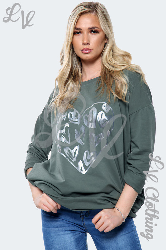 Ladies dark green sweatshirt with silver foil heart print, relaxed crew neck.