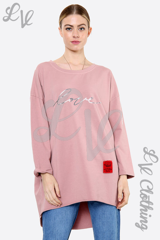 Dusty pink sweatshirt with Love script graphic and small red logo patch
